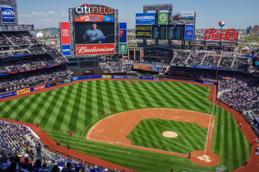 Broad view of the Citi Field stadium and numberous billboads on it