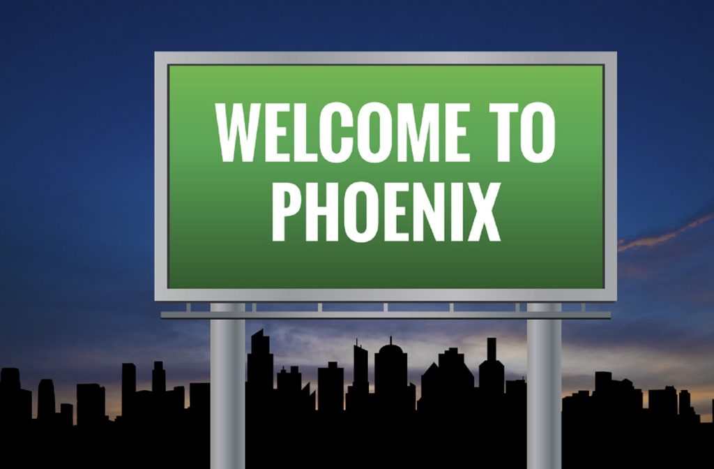 Welcome to phoenix sign silhouette skyline and sunset background